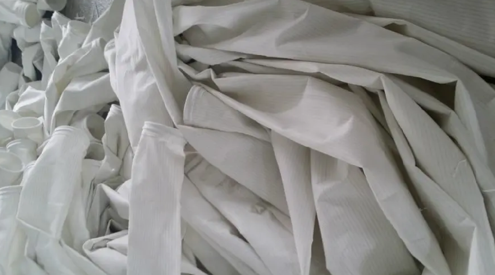 除尘滤袋烧毛轧光技术原理